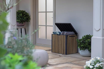Keter Signature Everwood 30 Gallon Resin Deck Box for Outdoor Storage – Weather‑Resistant Balcony & Patio Box for Cushions, Throw Pillows & Garden Tools, Walnut