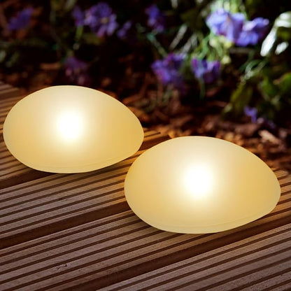 SUNNYPARK Solar Garden Lights Outdoor Set of 4 Plastic Pebble Shape Decorative Rock Lights Waterproof - Warm White