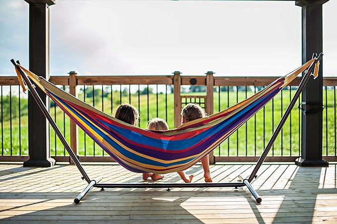 Vivere Double Cotton Hammock with Space Saving Steel Stand, Upgraded Polyester End Strings 450 lb Capacity - Premium Carry Bag Included - (Tropical)